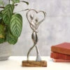 Transomnia Silver Metal Dancing Couple On Wooden Base Decoration -Yanke Home Shop transomnia decc705 dancing couple with heart on wooden base lifestyle