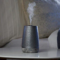 Yankee Candle Peaceful Dreams Silver Sleep Diffuser Starter Kit With 3 Refills -Yanke Home Shop yankee candle peaceful dreams sleep diffuser stater kit bundle lifestyle 3